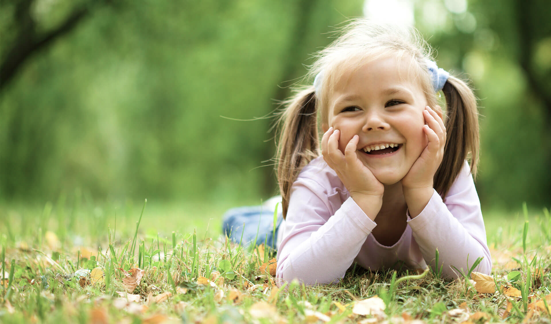 Girl laying in field